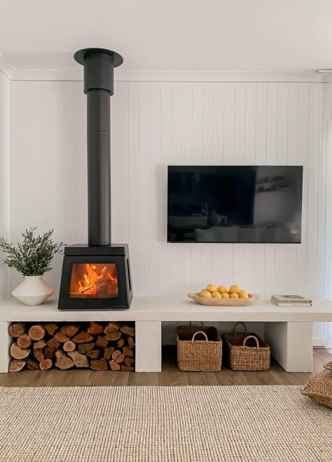 Fireplace With Wood Storage On Sides, Stand Alone Fireplace Living Rooms, Free Standing Log Burner Living Rooms, Free Standing Fireplace Ideas, Standalone Fireplace, Living Room Fireplace With Tv, Corner Wood Burning Stove, Terrace House Living Room, Modern Wood Stove