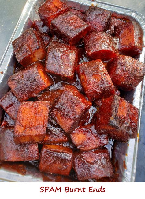 I’ve smoked SPAM. I’ve grilled SPAM. But I’d never made SPAM burnt ends until now. I can say without hesitation that my life is now complete. No, these aren’t beef brisket burnt ends. But believe me, they’re really good. My first bite was an ‘oh, dang!’ moment for me. Heck, yeah, give me some more! Smoked Spam Burnt Ends, Spam Burnt Ends, Smoked Spam, Poor Man's Burnt Ends, Brisket Burnt Ends, Smoker Ideas, Spam Recipes, Bbq Dishes, Smoked Food