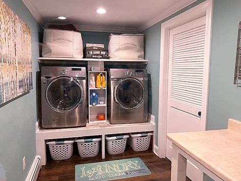 Laundry Room With Lots Of Storage, Under Counter Laundry Baskets, Front Loading Washer And Dryer Platform, Washer Dryer Garage, Washer And Dryer Closet, Laundry Basket Under Washer And Dryer, Front Load Laundry Room Ideas, Above Washer And Dryer Storage, Laundry Table