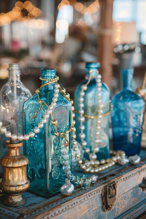 Dive into matrimonial bliss with our unique collection of nautical-themed wedding centerpieces. Think treasure chests filled with shimmering accents and bottles that whisk you away to the ocean's edge 🌊💍 Create a magical and adventurous tablescape that will enchant your guests. #WeddingInspiration #NauticalWedding #WeddingCenterpieces #TreasureDecor #BeachWeddingIdeas #RomanticWedding #UniqueWedding #TableDecor Mermaid Theme Wedding, Ocean Centerpieces, Nautical Wedding Centerpieces, Ocean Theme Party Decorations, Ocean Wedding Theme, Underwater Wedding, Underwater Party, Pirate Wedding, Aquarium Wedding