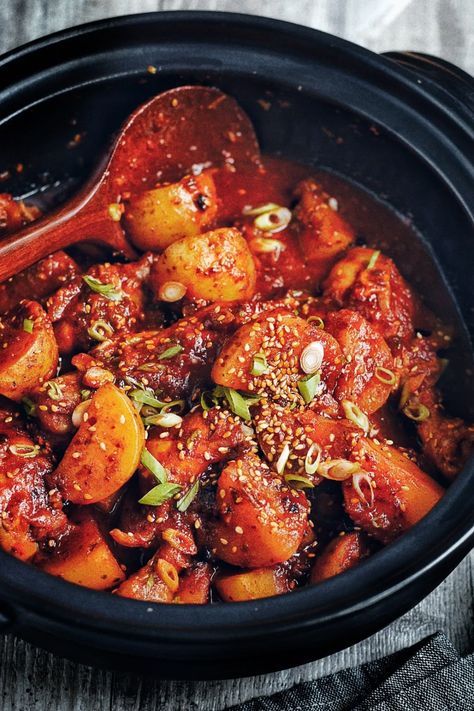 The ultimate one pot dish: Korean Spicy Braised Chicken, also known as Dak Dori Tang. Saucy, tender chicken that falls off the bone. Big chunks of potatoes and carrot. And that comforting deliciously savory spicy sauce! #BelgianFoodBliss Korean Spicy Chicken, Belgian Food, One Pot Dishes, Braised Chicken, Tender Chicken, Spicy Sauce, Spicy Chicken, The Bone, Chicken Tenders