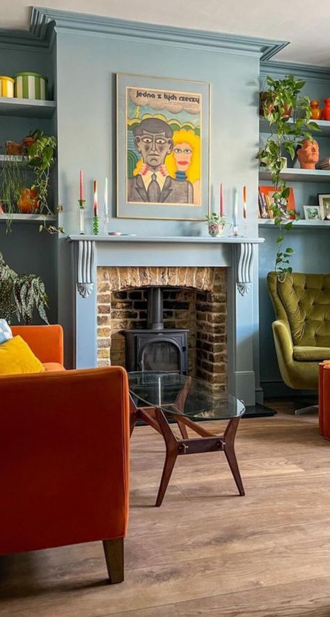 Colorful Fireplace, 50s Interior, Burnt Orange Living Room, 1930s House Renovation, Yellow Dining Room, Colourful Living Room Decor, Blue Living Room Decor, Pool Room, White Fireplace