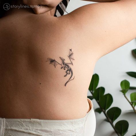 Small Dragon Tattoo For Women Simple, Dragon And Mountain Tattoo, Women Dragon Back Tattoo, Dragon Tattoo Back Shoulder, Modern Targaryen, Dragon Fine Line Tattoo, Shoulder Dragon Tattoo, Dainty Dragon Tattoo, Fine Line Dragon Tattoo