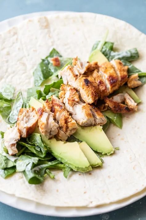 These simple Baja Chicken Wraps are a great healthy lunch. Packed with spinach, marinated and grilled chicken, and avocado, they are filling and nutritious! Make the chicken on the grill or in a skillet - whatever you have! macheesmo.com #chicken #wraps #lunch Protein Chicken Recipes, Chicken Wrap Recipes Healthy, Grilled Chicken And Avocado, Wraps Lunch, Baja Chicken, High Protein Chicken Recipes, Chicken Avocado Wrap, Chicken Wraps Healthy, Chicken Avocado Burger