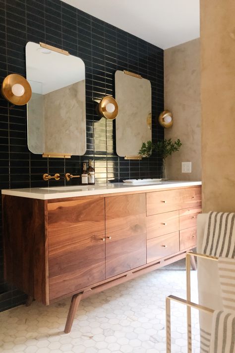 Moody midcentury modern bathroom.  Walnut vanity.  Dark navy stacked tiles.  Calacatta Gold Marble hexagon tile floor.  #bathroom #bathroomideas #bathroomdesign #midcenturymodern #bathroomrenovation Hoss Homestead, Parisian Bathroom, Hello Tuesday, Mid Century Modern Bathroom, Mid Century Bathroom, Wooden Vanity, Bad Inspiration, Bathroom Goals, Main Bathroom