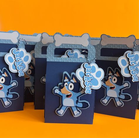 Bluey party box, Bluey Party supplies, Bluey Favor box, Personalized Bluey Birthday | Custom Bluey favor treats | BY PAPERCRAFTSIDEAS Bluey Gift Bags, Bluey Goodie Bags, Bluey Designs, Birthday Favors Kids, Bluey Party, Bluey Birthday, Party Box, Flag Banner, Party In A Box