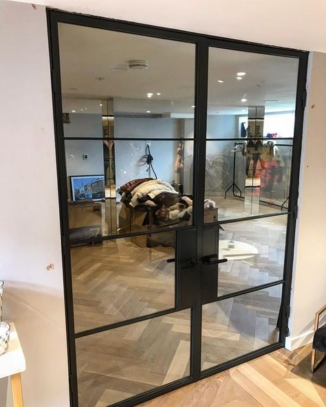 Double fire rated doors for a home gym in central London #crittalldoors #steeldoors #glassdoordesign Basement Gym Doors, Glass Door Gym, Gym Door Ideas, Glass Gym Doors, Home Gym With Glass Doors, Home Gym Doors, Home Gym Glass Doors, Gym Door Design, Home Gym Door Ideas