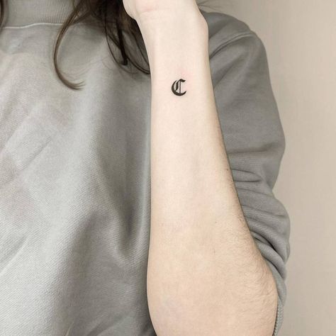 Letter "C" tattoo on the wrist. Letter C Tattoo, Latin Script, Tattoo On The Wrist, Initial Fonts, C Tattoo, Gothic Fonts, Initial Tattoo, Gothic Tattoo, Tiny Tattoo