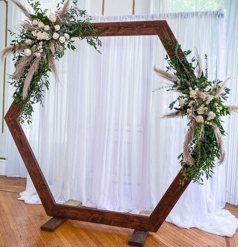 Hexagon Wedding Arch With Candles, Portable Hexagon Wedding Arbor, Hexagon Arches For Weddings, Wedding Ceremony Backdrop Hexagon, Hexagonal Backdrop Wedding, Diy Indoor Wedding Arch, Hexagon Wedding Arch Flowers Fall, Hexagon Arch Floral Arrangement, Wooden Octagon Wedding Arch