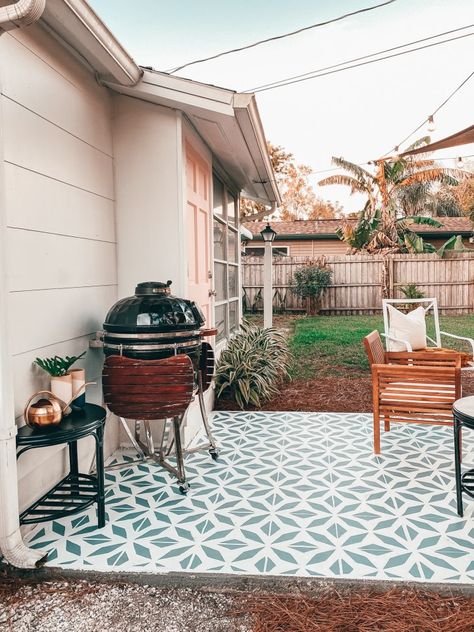 The Finished Patio (with painted pattern)   Shop the Look Painted Lattice, Blushing Bungalow, Lattice Patio, Rose Gold Candle, Backyard Dreams, Painted Patio, Rattan Side Table, Stenciled Floor, Bungalow Design