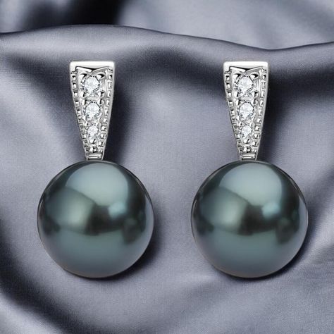 N A T U R A L ∙ T A H I T I A N ∙ B L A C K ∙ P E A R L ∙ S T U D ∙ E A R R I N G S Enhance your elegant style with these exquisite Natural Tahitian Black Pearl Stud Earrings in Sterling Silver. A perfect gift for Mother's Day and Women's Day. Handcrafted to perfection, these timeless beauties will elevate any outfit. Order now for a truly special gift! ♡ Rare and Valuable: Tahitian black pearls are among the rarest in the world, making them highly sought after. Their unique hues and natural brilliance are unmatched, reflecting the beauty of the ocean. ♡ Naturally Cultured: Tahitian pearls are rare and valuable, formed naturally in French Polynesia with captivating colors ranging from black and white to iridescent green, silver, and purple, each uniquely beautiful. ♡ Genuine Tahitian Black Black Pearl Earrings, Sophisticated Jewelry, Tahitian Black Pearls, Black Pearls, Iridescent Green, Tahitian Pearls, French Polynesia, Silver Gifts, Dainty Earrings