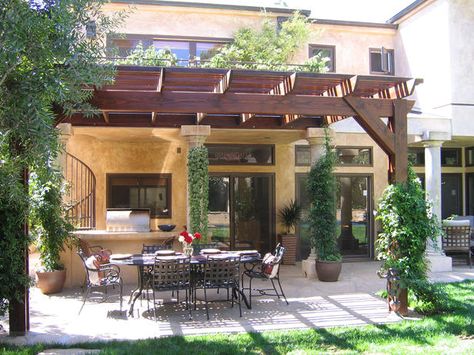 10 Mediterranean-Inspired Outdoor Spaces : Outdoors : HGTV Tuscan Patio, Attached Pergola, Inspiring Outdoor Spaces, Tuscan Style Homes, Outdoor Buildings, Wood Pergola, Tuscan Design, Outdoor Patio Space, Mediterranean Home Decor