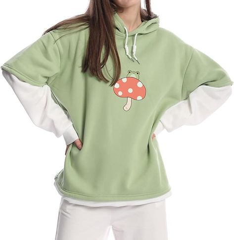 "Hop into style with our Women's Cute Frog Sweatshirt Mushroom Hoodie – the epitome of aesthetic charm! 🐸🍄 Elevate your wardrobe with this adorable and cozy piece that blends fashion and whimsy effortlessly. 🌈✨ Check out the link for the lowest prices and embrace the cuteness! 🛍️💕 #CuteFrog #MushroomHoodie #AestheticFashion #WomenStyle #CozyChic" Color Block Clothes, Spring Kawaii Crew Neck Hoodie, Cheap Kawaii Cotton Hoodie, Cheap Kawaii Hoodie Sweatshirt, Cute Frog Hoodie, Cheap Kawaii Graphic Print Sweatshirt, Mushroom Hoodie, Frog Sweatshirt, Frog Sitting