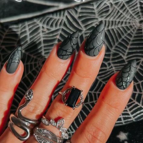 Transform your look this Halloween with our striking collection of Halloween black nails. Designed for those who prefer a sleek, dark style, these nails are perfect for creating a bold and mysterious manicure. For an added touch of spookiness, check out our spider web nails, featuring intricate designs that capture the eerie essence of the season. If you're looking for a simpler Halloween look, our collection of Halloween nails simple offers understated yet festive designs that are easy to wear and perfect for any occasion. Whether you choose classic black nails or opt for a spider web design, our Halloween-themed nails will give your manicure a stylish and seasonal update. 🎁 EACH SET OF NAIL INCLUDES: 10 HANDMADE press on nails of your size Adhesive tabs l Alcohol Pads l nail glue l file Long Nail Halloween Designs, Black Halloween Nail Designs Coffin, Halloween Nails Black Short, Spiderweb Gel Nails, Black N White Halloween Nails, Black Halloween Nails Spider Webs, Black Spooky Nails Almond, Black Nail Spiderweb, Checkerboard Halloween Nails