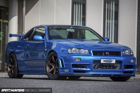 Considering the lukewarm reaction that the R33 GT-R got upon launch (and arguably still today), the R34’s GT-R reception couldn’t have been more different when it was unveiled in 1999. The more square-looking front and rear ends, aggressive scowl and tall front bumper gave it a road presence unlike any GT-R previous. But aside from … Nissan Gtr R34, Skyline Gtr R34, R34 Gtr, Nissan Skyline Gt R, Gtr R34, Nissan Skyline Gt, Nissan Gtr Skyline, Nissan Skyline Gtr, Skyline Gtr