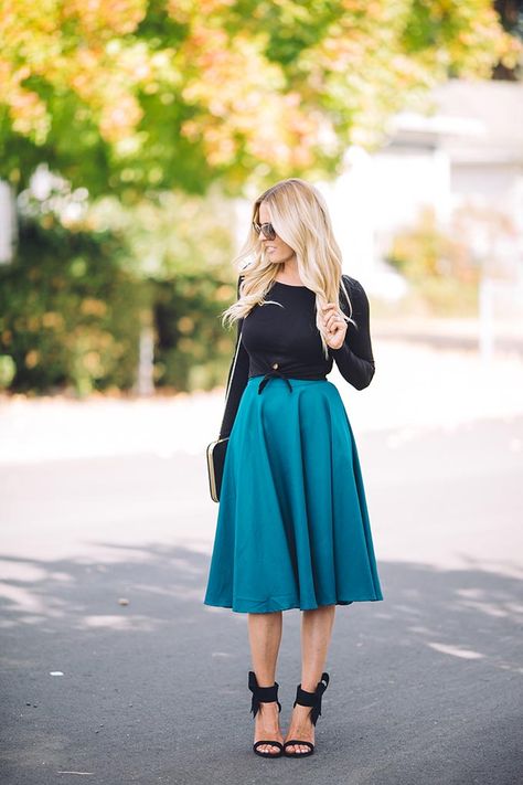 Easy holiday outfit | teal midi skirt | black bow pumps | black crop top | clutch | sunglasses Teal Skirt Outfit Color Combinations, Turquoise Skirt Outfit, Teal Skirt Outfit, Teal Outfit, Fall City Outfits, Teal Midi Skirt, Turquoise Skirt, Teal Skirt, Teal Outfits