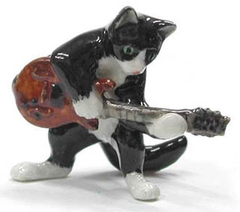 Tuxedo Cat with Electric Guitar Cat With Electric Guitar, Cat Electric Guitar, Black And White Tuxedo, Porcelain Animal, Cats Musical, White Tuxedo, Tuxedo Cat, Cat Playing, Silly Cats