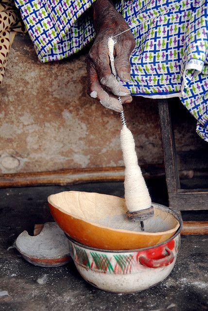 Spinning cotton in Benin.  This is how they spin cotton, with a twist to a whirligig (?) in a calabash bowl. Hugo van Tilborg, via Flickr             2     3        Newer Older  This is how they spin cotton, with a twist to a whirligig (?) in ... Spinning Cotton, Cotton Spinning, Hand Spindles, Spindle Spinning, Spindle Whorls, Wire Crochet Jewelry, Spinning Wool, Spinning Yarn, Wire Crochet