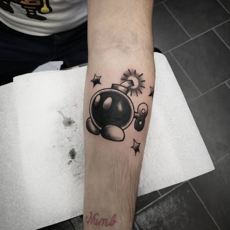 Bobomb Mario Tattoo, Chain Chomp Tattoo, Bomb Tattoo, Chain Chomp, Mario Tattoo, Prison Tattoos, Fresh Tattoo, Weird Tattoos, Gaming Tattoo