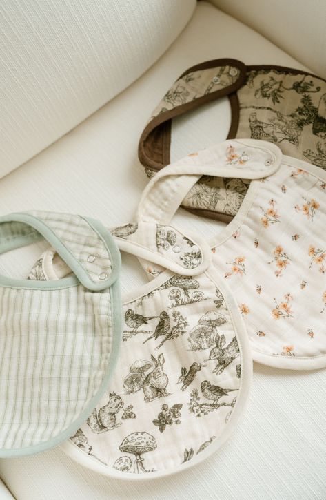 This two-pack of infant bibs is made from supersoft organic-cotton muslin to keep baby protected from drips and drools. Pack of two assorted bibs Snap closure 100% organic cotton Machine wash, tumble dry Imported Newborn Baby Supplies, Baby Stuff Aesthetic, Vintage Safari Nursery, Muslin Baby Clothes, Sewing Projects Baby, Baby Stuff Must Have, Aesthetic Baby Clothes, Baby Must Haves Newborn, Baby Boy Gift Ideas