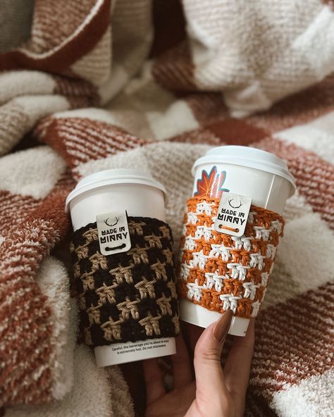 new coffee cup sleeves in the shop 🍁☕️🧡 crocheted >> striped / checkered / waffle vegan faux leather tags in chestnut & white marble great for your car, purse & cute to gift limited quantities — 🔗in stories/profile ☺️🍂 [patterns coming soon] 🧶 happy friiiidayyyy!!! #crocheted #crochetdesigner #coffeesleeve Cup Sleeve Crochet, Crochet Cup Sleeve, Pumpkin Coffee Sleeve Crochet, Starbucks Crochet Cozy, Crochet Coffee Sleeve, Crochet Espresso Cup, Crochet Coffee Cup Sleeve, Crochet Fall Cup Sleeve, Tumblr Cup