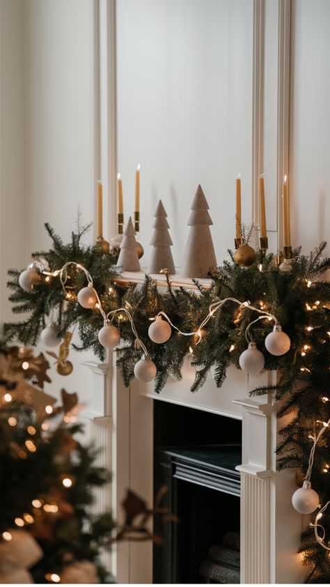 Festive holiday mantel with candles, pine garland, and white ornaments. Simple Mantle Christmas Decor, Mantle Modern, Thanksgiving Living Room Decorations, Mantle Christmas Decor Ideas, Christmas Mantle Decorations, Mantle Christmas Decor, Simple Mantle, Decorations After Christmas, Winter Mantle