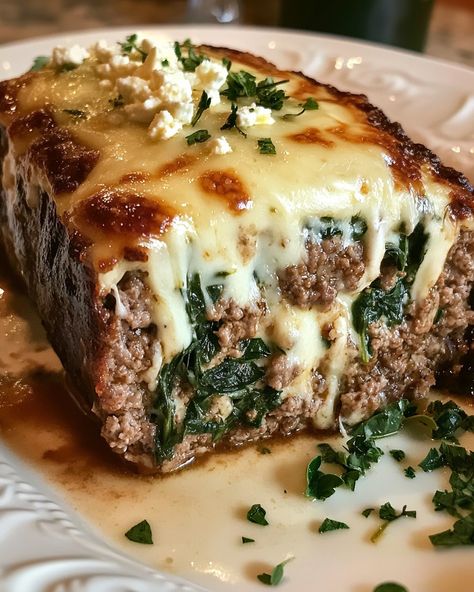 Stuffed Meatloaf with Spinach and Feta Melted Swiss Cheese - SavorySplash Spinach And Cheese Stuffed Meatloaf, Meatloaf With Spinach, Mediterranean Meatloaf, Spinach Meatloaf, Swiss Cheese Recipes, Cheese Stuffed Meatloaf, Stuffed Meatloaf, Homemade Meatloaf, Turkey Cheese