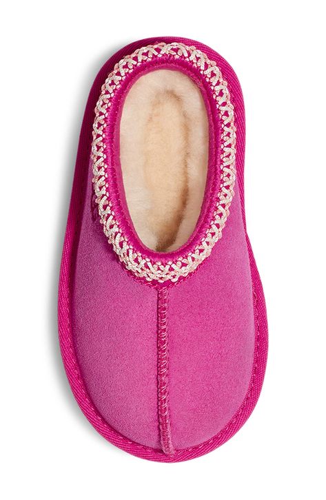 UGG's bestselling slipper is scaled down for kids and lined completely in cozy UGGplush™, a wool-blend textile designed to feel and wear like genuine shearling. Water-resistant Leather upper/UGGplush wool-blend lining/synthetic sole Imported This product was made in a factory that supports women-worker empowerment through HERproject, which creates partnerships to enable workplace-based interventions on health, financial inclusion and gender equality Ugg Slippers Ugg, Uggs Ugg, Preppy Christmas Gifts For Teens, Uggs For Kids, Colorful Uggs, Kids Christmas Gifts, Preppy Christmas Gifts, Kids Ugg Slippers, Cute Uggs