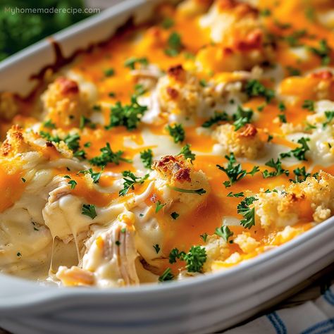 Our Million Dollar Chicken Casserole is a true treasure on the table, blending creamy textures and luxurious flavors to create a dish that promises to delight. With its rich cream cheese, tender chicken, and a golden crust that's simply irresistible, it's a gourmet experience that's surprisingly simple to achieve. Chicken Almondine Casserole, Chicken And Cream Recipes, Cracker Chicken Casserole, Million Dollar Chicken Casserole, Ritz Cracker Chicken Casserole, Recipes Using Cream Cheese, Million Dollar Chicken, Ritz Cracker Chicken, Firecracker Chicken