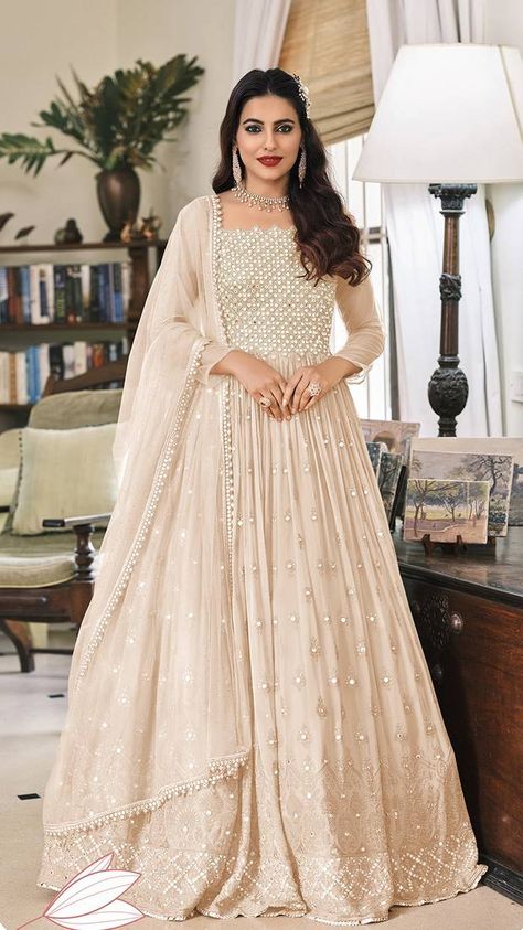 Every time you dress up in this trendy salwar kameez in cream colour georgette, heads will turn. (1 Top / 1 Bottom / 1 Dupatta)