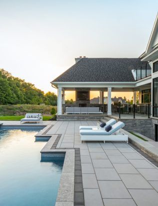 Modern Pool Pavers And Coping, Pool Coping And Decking Ideas, Pool Pavers Decking, Slate Pool Deck, Pavers Around Pool Landscape Design, Unilock Beacon Hill Smooth Opal, Paver Patio Around Pool, Patio To Pool Deck Transition, Pool Deck Flooring Ideas