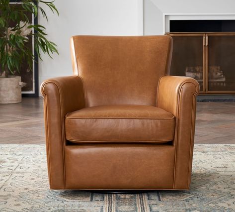 Irving Roll Arm Leather Swivel Armchair | Pottery Barn Irving Roll Arm Leather Swivel Armchair, Tables Beside Fireplace, Small Leather Recliner, Pottery Barn Leather Chair, Leather Rocker Recliner, Leather Swivel Recliner Chair, Pottery Barn Swivel Chair, Recliner Chairs In Living Room, Swivel Glider Chair Living Room