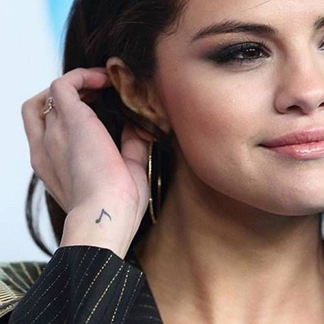 Eight Note Tattoo, Tatoos Music, Musical Note Tattoo, Selena Gomez Tattoo, Small Music Tattoos, Small Feminine Tattoos, Selena Selena, Music Notes Tattoo, Hidden Tattoos