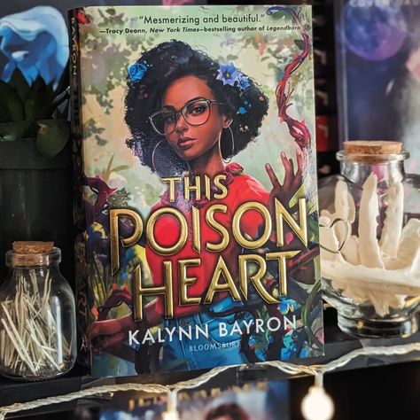 MOAR Black book recs! Kalynn Bayron delivers an excellent duology with This Poison Heart & This Wicked Fate 🌱💀🖤 Breseis inherits more than just a house when her aunt dies. It comes with a centuries old curse, secrets about the birth family she never knew, and magic; like the kind that lets her grow plants with a single touch. This series was So Good 🖤🌱🖤 Great for contemporary fantasy fans, and featuring a creepy old house, some gothic vibes, generational trauma, LGBTQ characters & twis... Kalynn Bayron, Lgbtq Characters, Poison Heart, Creepy Old Houses, Contemporary Fantasy, Grow Plants, Book Recs, Black Book, Black Books