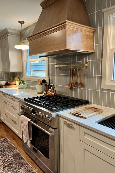 Soft Beige makes a BIG impact in this cozy neutral kitchen by designer Suzanne: stacked gray subway tile provides the contrasting backdrop while the woodgrain hood offers a warm focal point. White And Navy Kitchen, Stacked Cabinets, Gray Subway Tile, Navy Blue Kitchen Cabinets, Beige Kitchen Cabinets, Kitchen Cabinets Grey And White, 10x10 Kitchen, Beige Cabinets, Order Kitchen