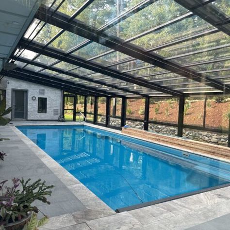 Retractable Pool Enclosure, Amherst MA by Roll-A-CoverAmerica's Leading Custom Manufacturer of Retractable Enclosure and Roof Systems Retractable Enclosure, Lap Pools, Swimming Pool Waterfall, Indoor Pool House, Swimming Pool Enclosures, Indoor Pool Design, Pool Enclosures, Retractable Roof, Pool Waterfall