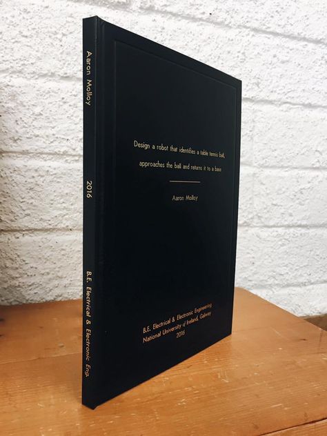 BE Electrical and Electronic Engineering Thesis, National Univeristy of Ireland, Galway 2016. Hardbound in black leatherette with gold embossing front and spine. www.kennysbindery.ie Ireland Galway, Front Cover Designs, Gold Embossing, Scrapbook Book, Electronic Engineering, Galway, Book Binding, Bending, Pattern Making