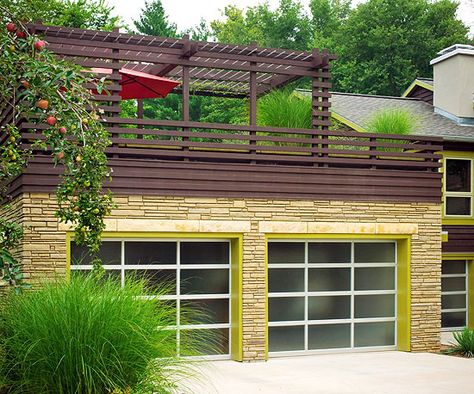 These streamline garage doors fit perfectly with the contemporary feel of this home. More great garage doors: http://www.bhg.com/home-improvement/garage/ideas-inspiration/garage-door-styles/?socsrc=bhgpin052213chartreusegarage=4 Small Garage Door, Double Garage Door, Mission Style Homes, Custom Garage Doors, Garage Door Styles, Garage Roof, Wood Garage Doors, Glass Garage Door, Rooftop Terrace Design