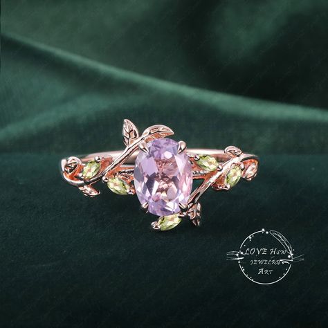 Art Deco Oval Lavender Amethyst engagement ring Bridal  Rose Gold Unique Leaf Nature Inspired  Gemstone Promise Cluster ring jewelry Gift (Please comfirm your US size when you make an order) Jewelry details: Matal Type: 14k gold /18k gold Engagement Ring: Center Stone: Lavender Amethyst Stone Size: 6*8mm Side stones: peridot Total weight: 0.18ctw (High Quality) Wedding band Moss Agate and moissanite Carat Weight: approx. 0.182ctw Or: black sapphire (If you choose side stone in black sapphire) Purchase Guarantee: 1: Provide you with the best service. 2: 14 Day Refund Guarantee. 3: Free Gift Box&Packing 4: Free Shipping and insurance to All Parts Of The World. Accessories: beautiful Ring box, and little gifts. Processing time: When we receive payment We need 2-3 weeks to work for your items Lavender Engagement Ring, Lavender Sapphire Engagement Ring, 18k Gold Engagement Ring, Diy Jewelry Set, Stacked Rings, Amethyst Engagement Ring, Bridal Roses, Lavender Amethyst, Amethyst Ring Engagement