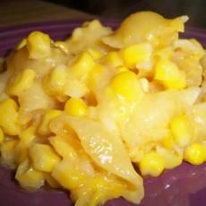 Miranda Lambert's Corn Casserole    Ingredients:  - 1 can creamed corn  - 1 can whole-kernel corn (not drained)  - 1 cup uncooked macaroni  - 1/2 cup butter, sliced  - 8 oz cubed cheese (Velveeta) or shredded cheddar cheese. Preheat oven to 350 degrees. Grease a casserole dish & set aside. Mix creamed corn, whole-kernel corn & uncooked macaroni in a medium bowl. Add butter & cheese. Place in the casserole dish & cover. Bake for 30 minutes. Uncover, stir & bake for 30 more minutes. Serves 4. Baked Creamed Corn Casserole, Cheesy Corn Casserole, Macaroni Casserole, Cream Corn Casserole, Casserole Dish Set, Corn Casserole Recipe, Easy Macaroni, Corn Casserole, Thanksgiving Dishes