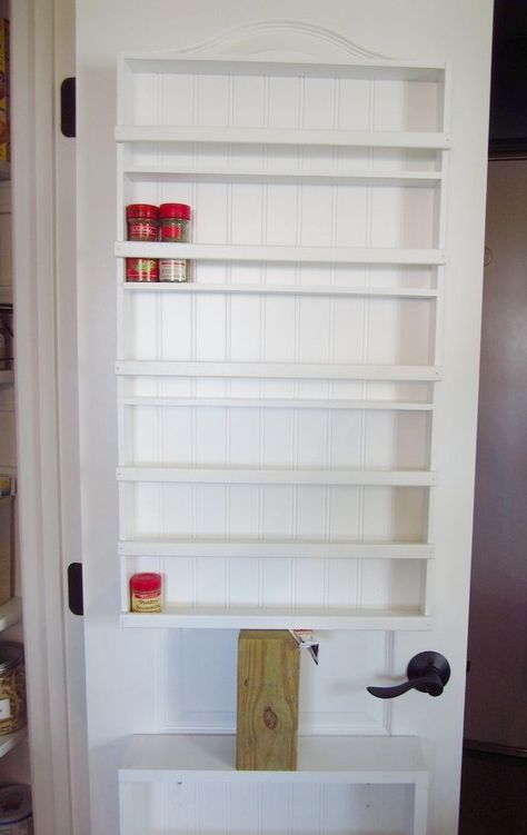 DIY door mounted spice rack | Home Staging In Bloomington Illinois Spice Rack On Pantry Door, Pantry Spice Rack, Pantry Door Storage, Door Mounted Spice Rack, Chicago Kitchen, Pantry Door Organizer, Door Spice Rack, Bigger House, Diy Spice Rack