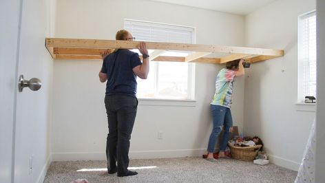 Are you struggling with the small bedroom blues like we were? We needed to figure out how to comfortably fit our two girls into a small bedroom, and I think you might be interested to find out how we solved our space issue. Before, we tried out this loft bed from Amazon, but it just didn't work well and took up too much floor space. I came to the conclusion that the only way to get the most out of this space, was to customize a loft bed for the bedroom. First, we measured the total Diy Loft Twin Bed, Loft Bed Over Window, Diy Loft Bed For Teens, Built In Loft Bed, Bed Infront Of Window, Bedroom Blues, Loft Bed Ideas For Small Rooms, Loft Beds For Teens, Small Room Diy