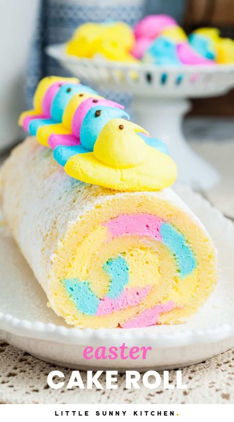 This easy Easter Cake Roll is a light and fluffy vanilla cake wrapped around marshmallow buttercream and topped with cute marshmallow peeps. Easter Cake Roll, Easter Cake Easy, Peeps Cake, Unfrosted Cake, Little Sunny Kitchen, Marshmallow Buttercream, Sunny Kitchen, Cake Roll Recipes, Cake Wraps