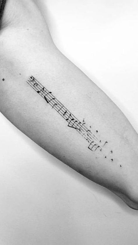 Harmony in Ink: Music notes tattoo ideas. Explore designs that capture the rhythm and melody of your favorite tunes in a timeless and artistic symphony. Music Note Tattoo Ideas, Notes Tattoo, Fine Line Tattoo Ideas, Round Tattoo, Music Notes Tattoo, Line Tattoo Ideas, Music Note Tattoo, Note Tattoo, Fine Line Tattoo