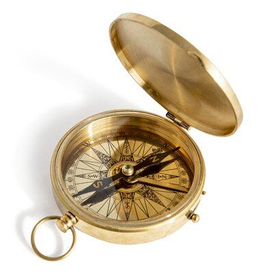 A bronzed pocket compass, a reproduction from the 19th C. Campaign trail. | Breakwater Bay Santos Decorative Pocket Compass Metal in Brown, Size 3.25 H x 4.0 W x 4.0 D in | Wayfair | Home Decor Magnetic Compass, Vintage Compass, Pocket Compass, Spice Island, Mariners Compass, Authentic Models, Polished Brass, Meaningful Gifts, Decorative Objects