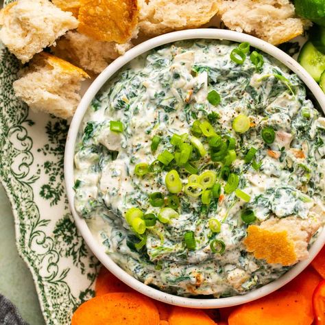 Spinach dip in a serving dish topped with green onions and a piece of crusty bread dipped in surrounded by more bread cubes and carrot slices. Cottage Cheese Spinach, Cheese Spinach Dip, Oh Snap Macros, Macro Eating, Classic Spinach Dip, Spinach Cheese Dip, Protein Cottage Cheese, Fried Dill Pickles, Taco Mac And Cheese