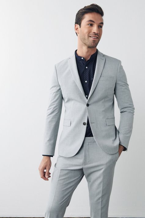 Get ready to suit up this summer with our Motion Flex jacket. Designed with floral lining, and notch lapel in our four way stretch fabric, this blazer is lightweight with easy stretch and movement - perfect for those summer weddings and parties. Matching items available. Dry clean only. Main 55% Recycled polyester, 34% Viscose, 7% Polyester, 4% Elastane. Lining 60% Recycled polyester, 35% Polyester, 5% Elastane. Light Grey Suit Men, Grey Suit Men, Light Grey Suits, Grey Suit, Designer Suits For Men, Easy Stretches, Iron Shirt, Groomsmen Suits, Gray Suit