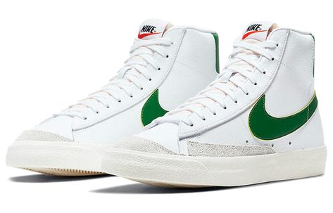 Experience the timeless style of the Nike Blazer Mid '77 Vintage 'White Pine Green'. The classic design features white leather on the upper with soft suede and synthetic details for a vintage look. The ultra-clean colors continue underfoot, where the construction fuses the outsole to the midsole for a streamlined look. And for added traction and durability, it's finished with a solid rubber outsole with herringbone pattern. Step into timeless style with these iconic Nike Blazer Mid shoes. Nike Blazer 77 Vintage, Wishlist Shoes, Blazer 77, Mens Blazers, Blazer Mid 77 Vintage, Nike Blazers, Basket Vintage, Burgundy Shoes, Nike Blazer Mid 77