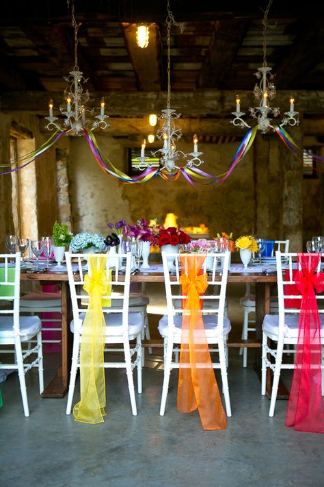 Chair Decorations Party, Bright Colour Wedding, Colourful Wedding Decorations, Rainbow Wedding Decor, Rainbow Wedding Ideas, Rainbow Wedding Decorations, Colourful Chairs, Colorful Wedding Decorations, Rainbow Wedding Theme