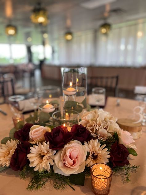 Centerpieces Wedding Candles And Flowers, Maroon And Gold Wedding Centerpieces, Burgundy Winter Wedding Centerpieces, Burgundy Champagne Wedding Centerpieces, Simple Wedding Centerpieces Burgundy, 3 Vase Centerpiece Ideas, Floating Candle Table Decor, Cabernet Wedding Centerpieces, Red Floral Centerpieces Wedding